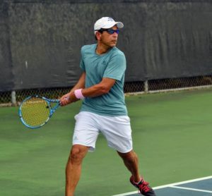 Tennis player with Adidas men's tennis shorts