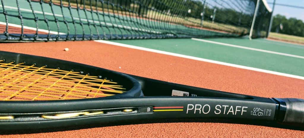 Wilson Pro Staff 97v13 tennis racquet on court