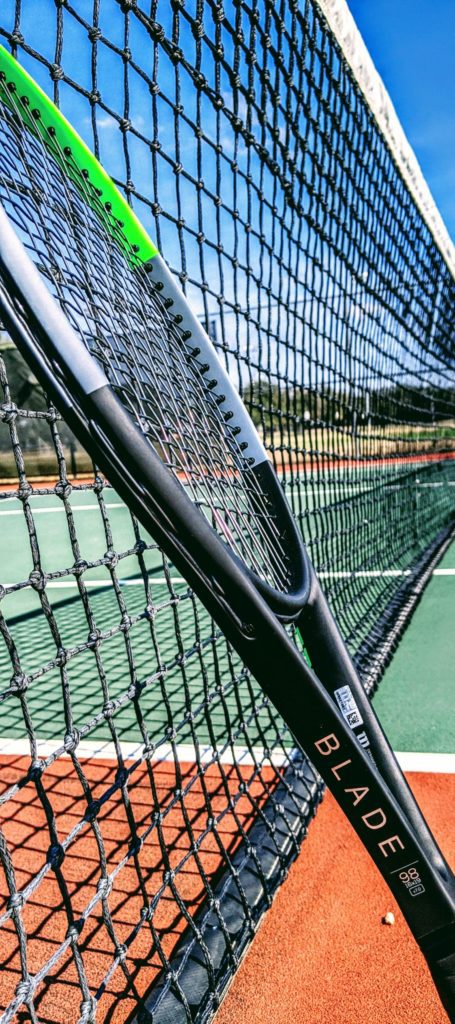 Wilson Blade tennis racquet on court