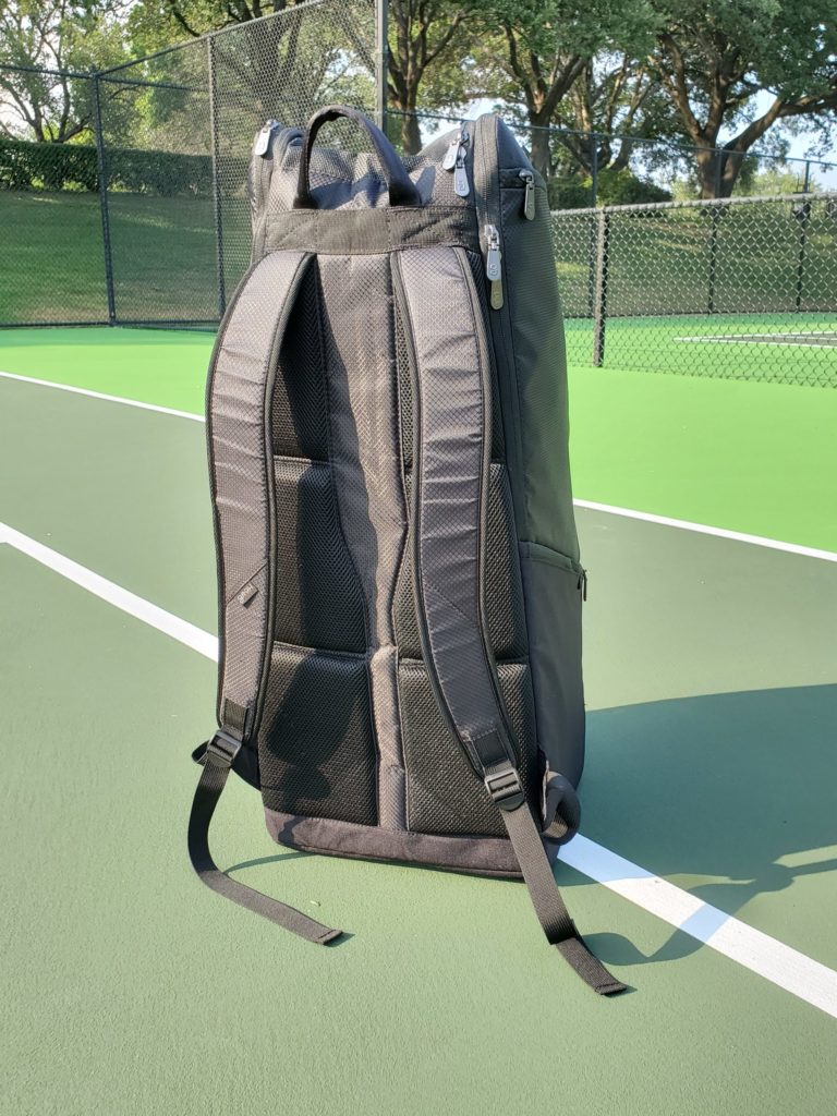 Backpack straps on the Geau Tennis bag on the tennis court