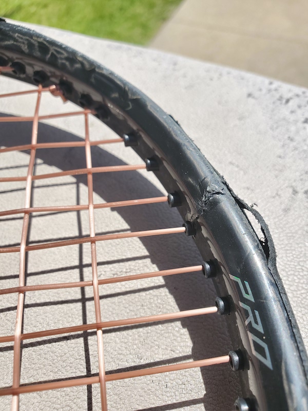 Cracked tennis racquet