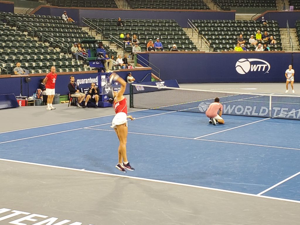 Caroline Dolehide playing mixed doubles with Will Blumberg at World Team Tennis