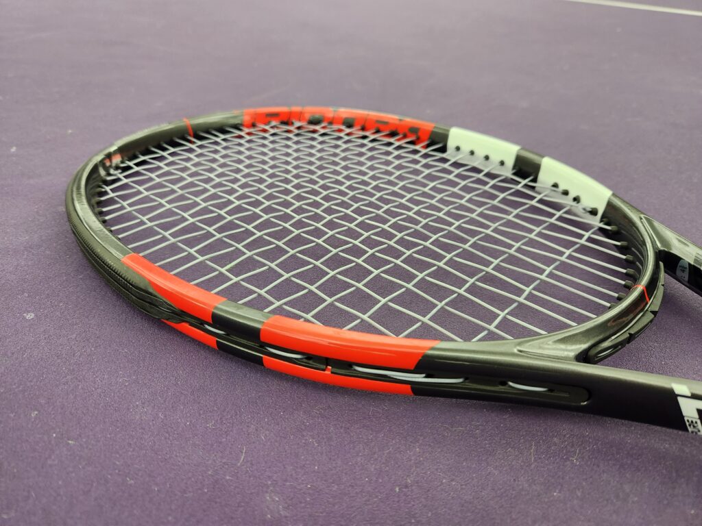 Babolat Pure Strike Review: Compare Versions & Other Racquets