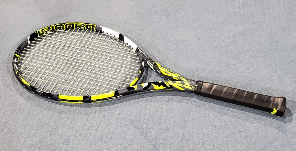 Babolat Pure Aero tennis racquet on the court