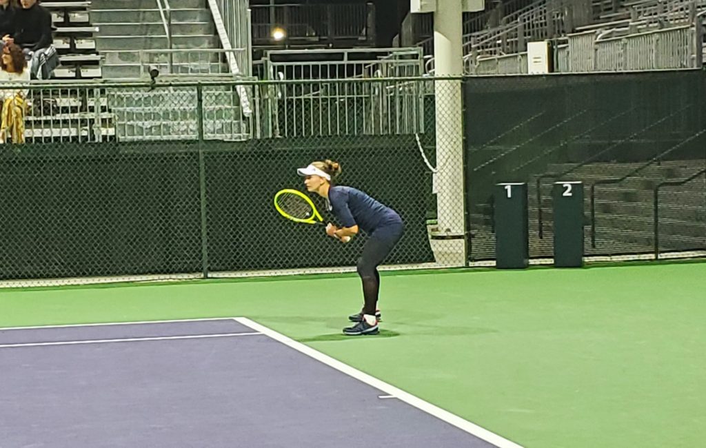 Barbora Krejcikova returns serve at Indian Wells