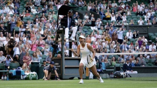 Desirae Krawczyk celebrates winning the Wimbledon mixed doubles title