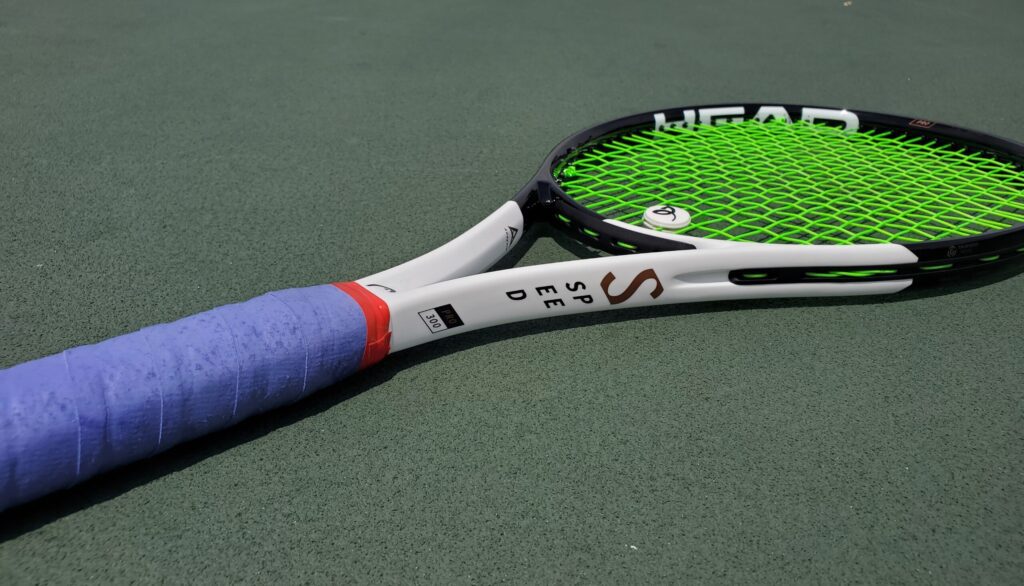 Head Speed tennis racquet on the tennis court