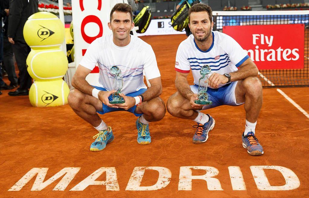 Horia Tecau and Jean-Julien Rojer celebrate after winning the Madrid Open