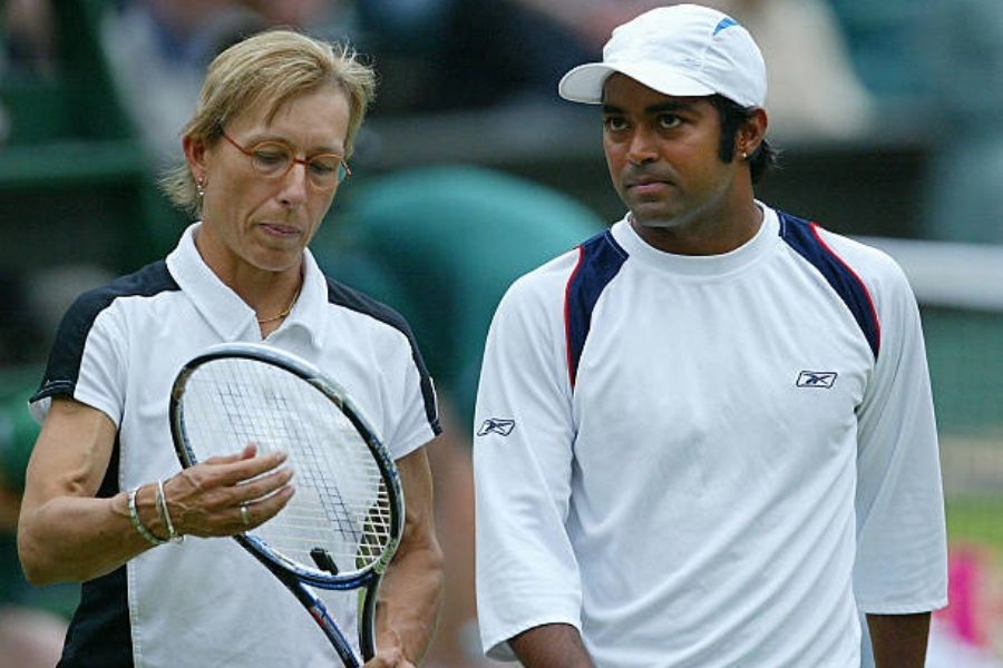 Martina Navratilova and Leander Paes playing mixed doubles