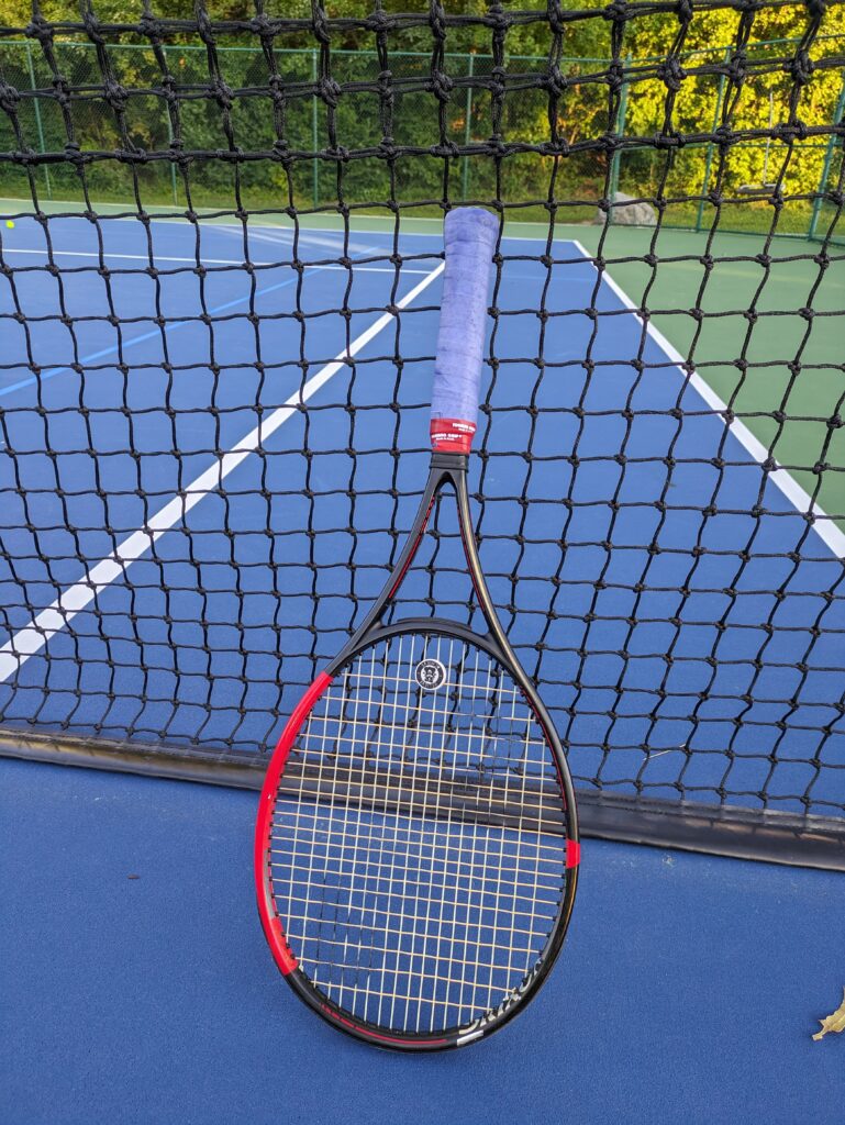 Dunlop CX 200 Tour 18x20 tennis racquet on the court