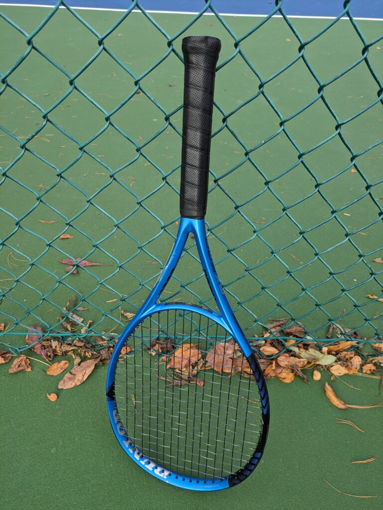 Dunlop FX Tennis racquet on the tennis court