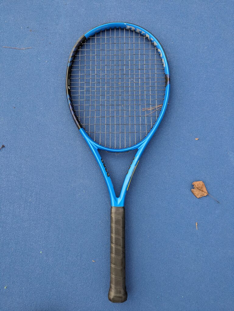 Dunlop FX Tennis racquet on the tennis court