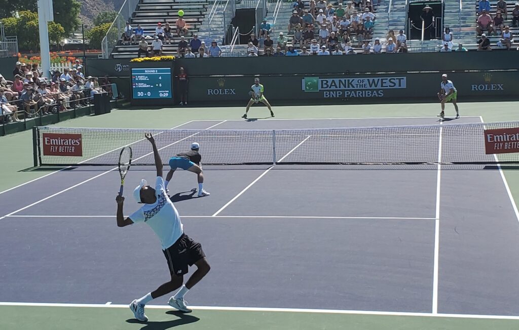 Rajeev Ram hits a spin serve with the Babolat Pure Aero