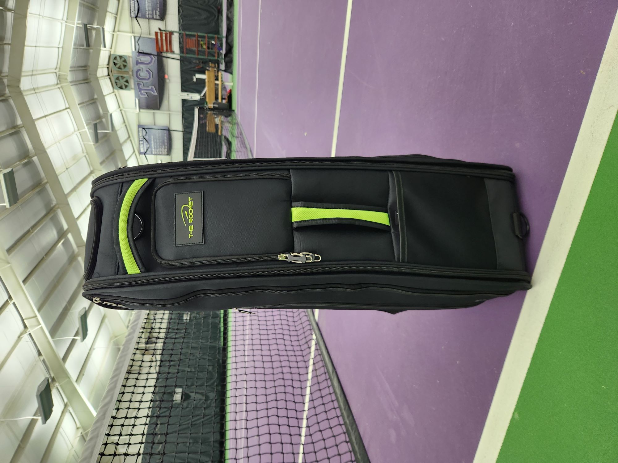 Rocket tennis bag on the court